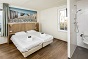 Schlafzimmer des behindertengerechtes Ferienhauses für 8 Personen in Cadzand Bad und Holland